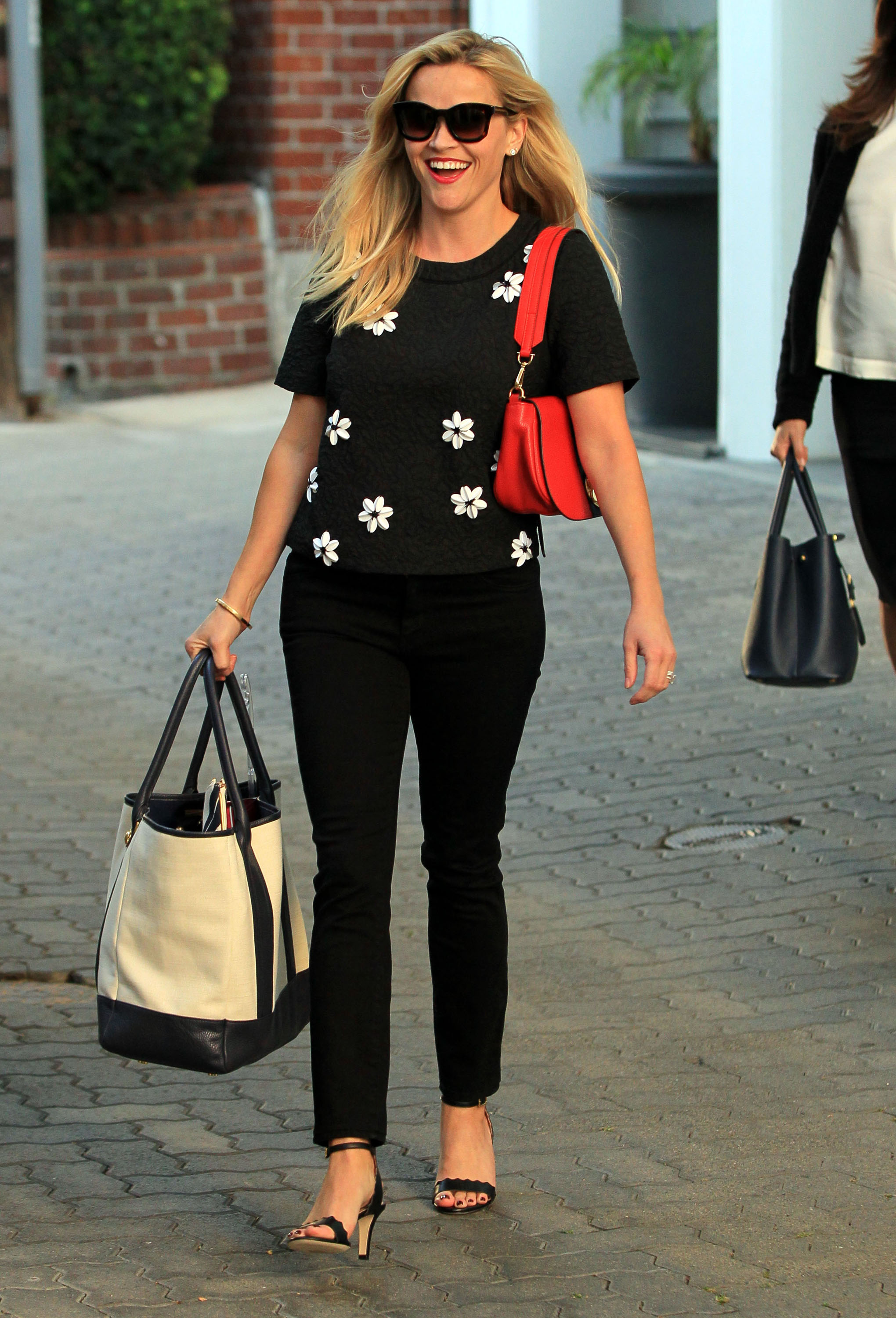 L.L.Bean - StyleBistro spotted Reese Witherspoon with a monogrammed L.L.Bean  Boat and Tote. Any guesses what LWR stands for?
